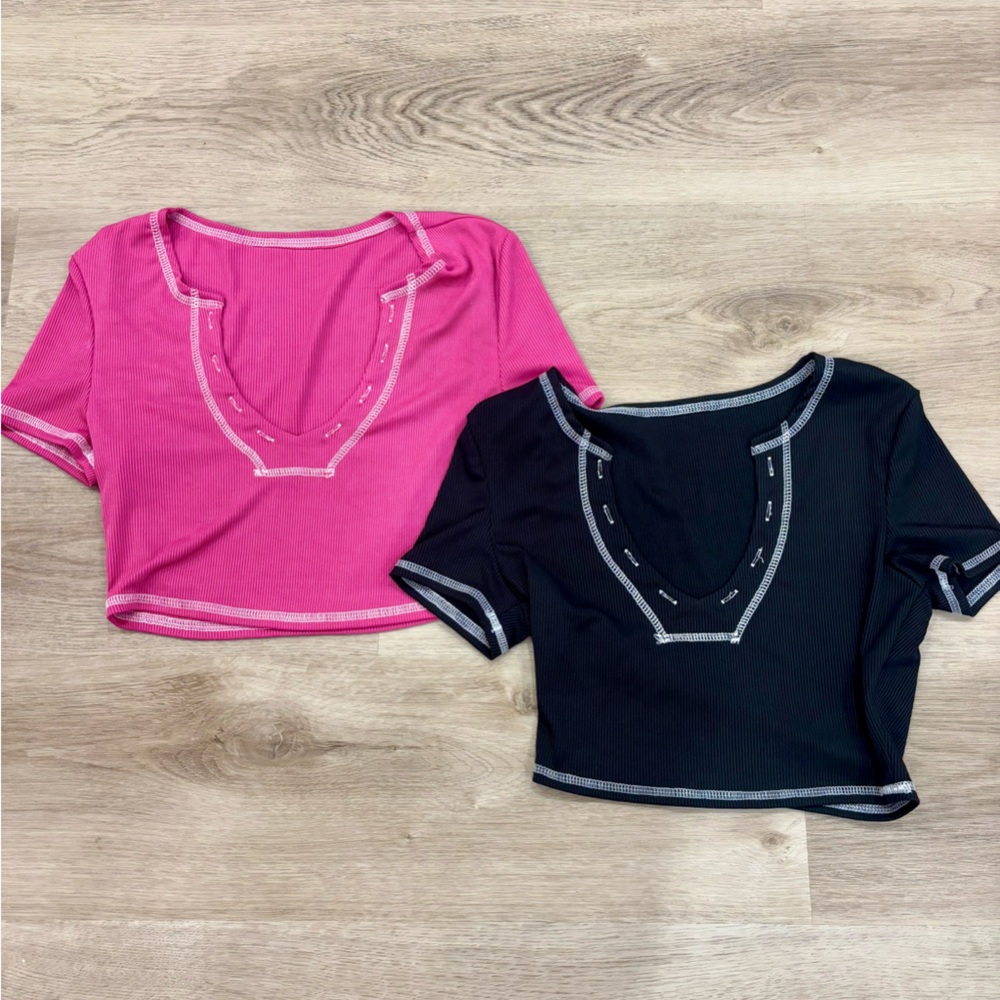 Pink and black cropped shirts